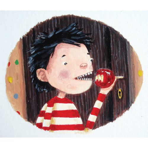 Boy eating candy apple